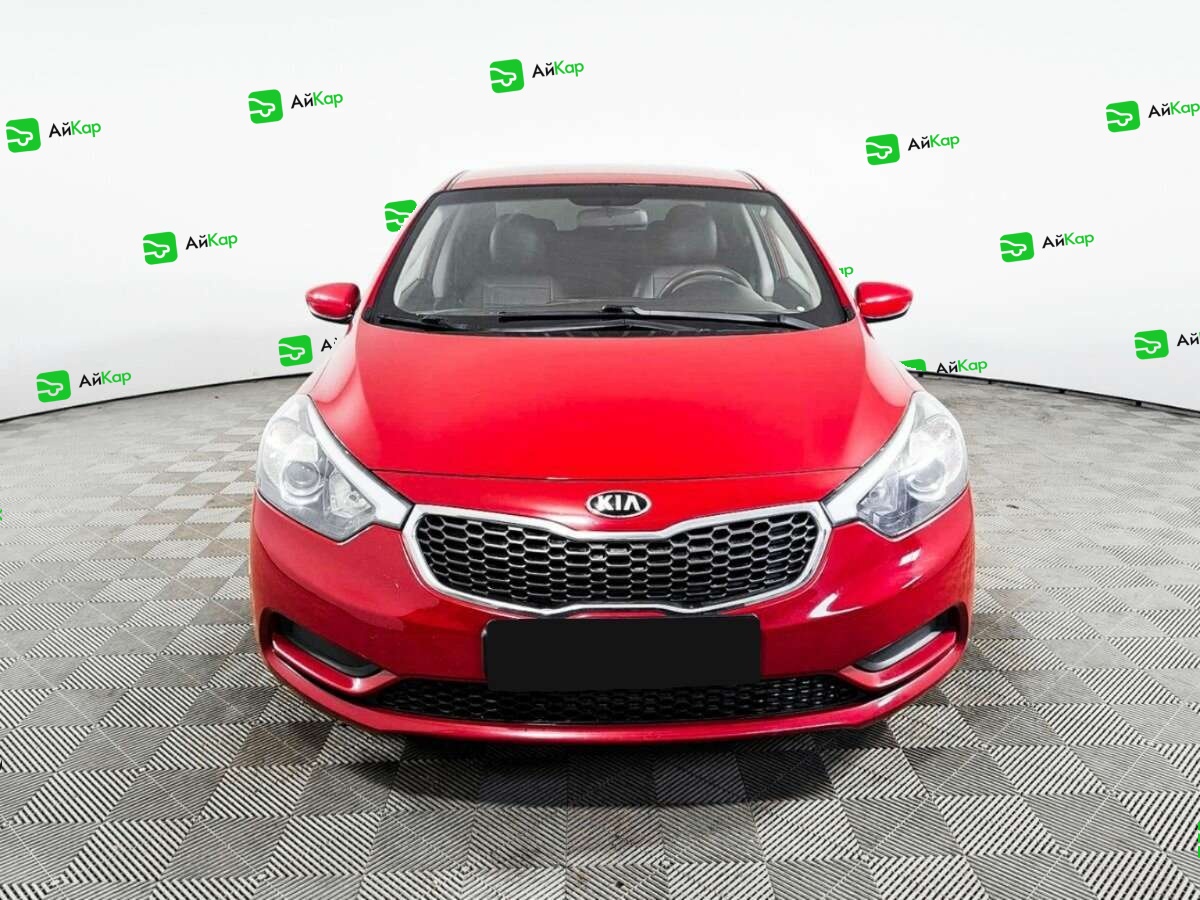 Kia Cerato с пробегом — 2013 год. Фото: #1