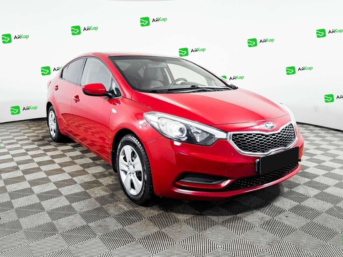 Kia Cerato с пробегом — 2013 год. Фото: #2