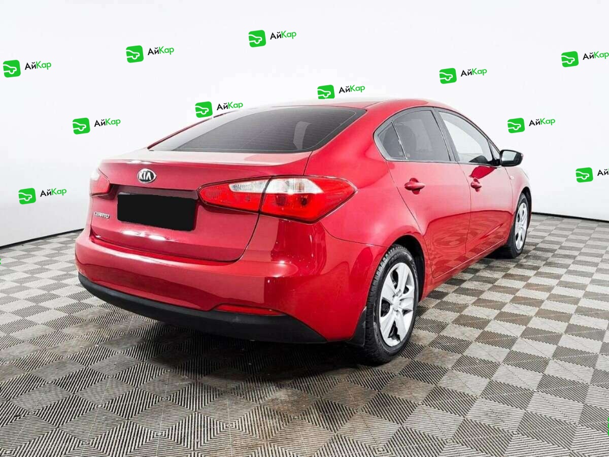 Kia Cerato с пробегом — 2013 год. Фото: #3