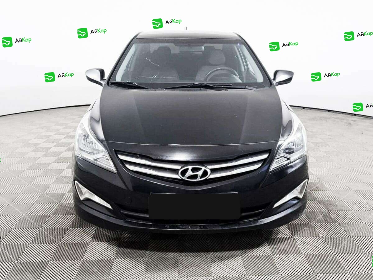 Hyundai Solaris с пробегом — 2015 год. Фото: #1