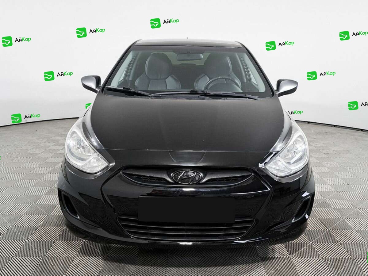 Hyundai Solaris с пробегом — 2012 год. Фото: #1