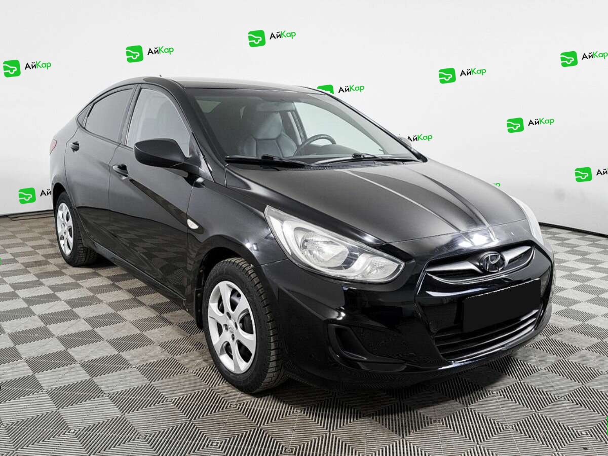 Hyundai Solaris с пробегом — 2012 год. Фото: #2