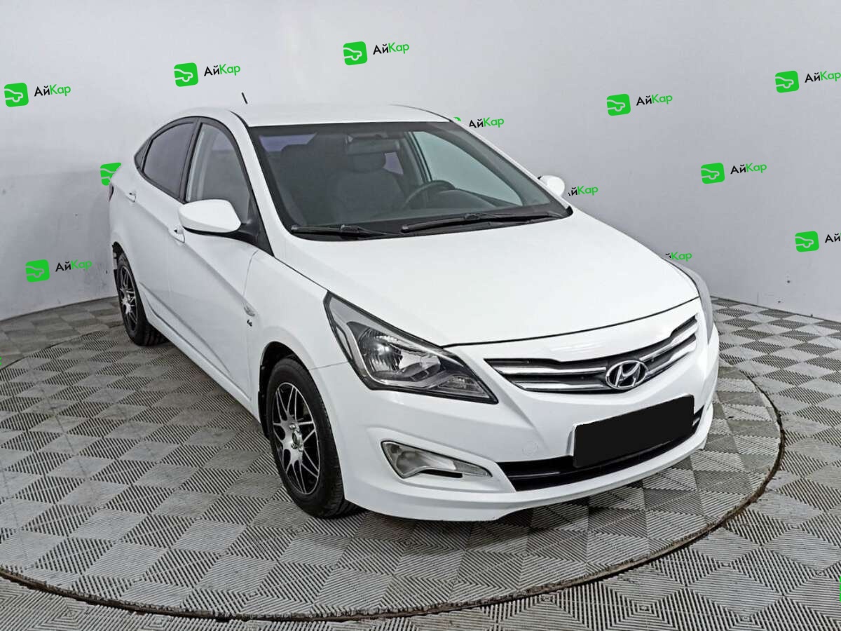 Hyundai Solaris с пробегом — 2015 год. Фото: #2