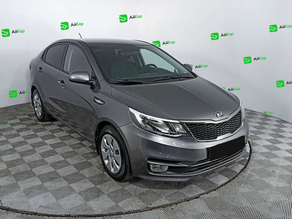 Kia Rio с пробегом — 2015 год. Фото: #2