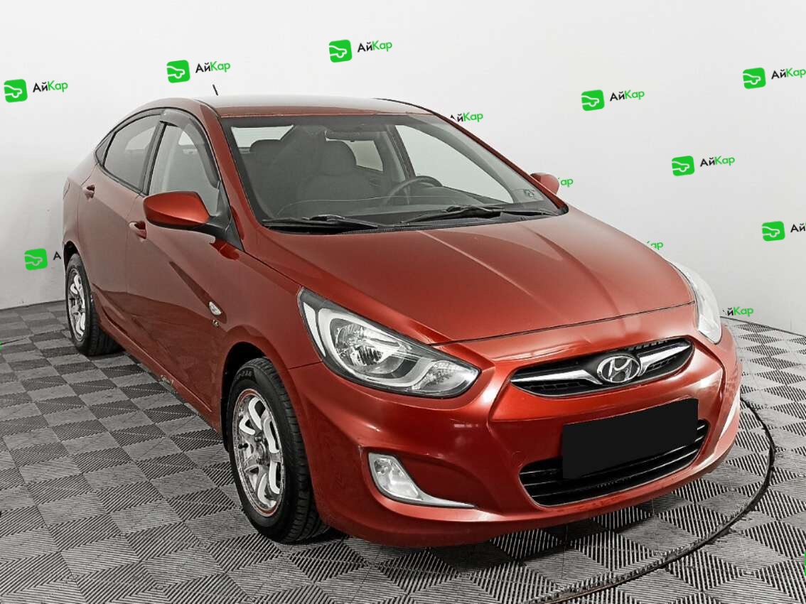 Hyundai Solaris с пробегом — 2012 год. Фото: #2