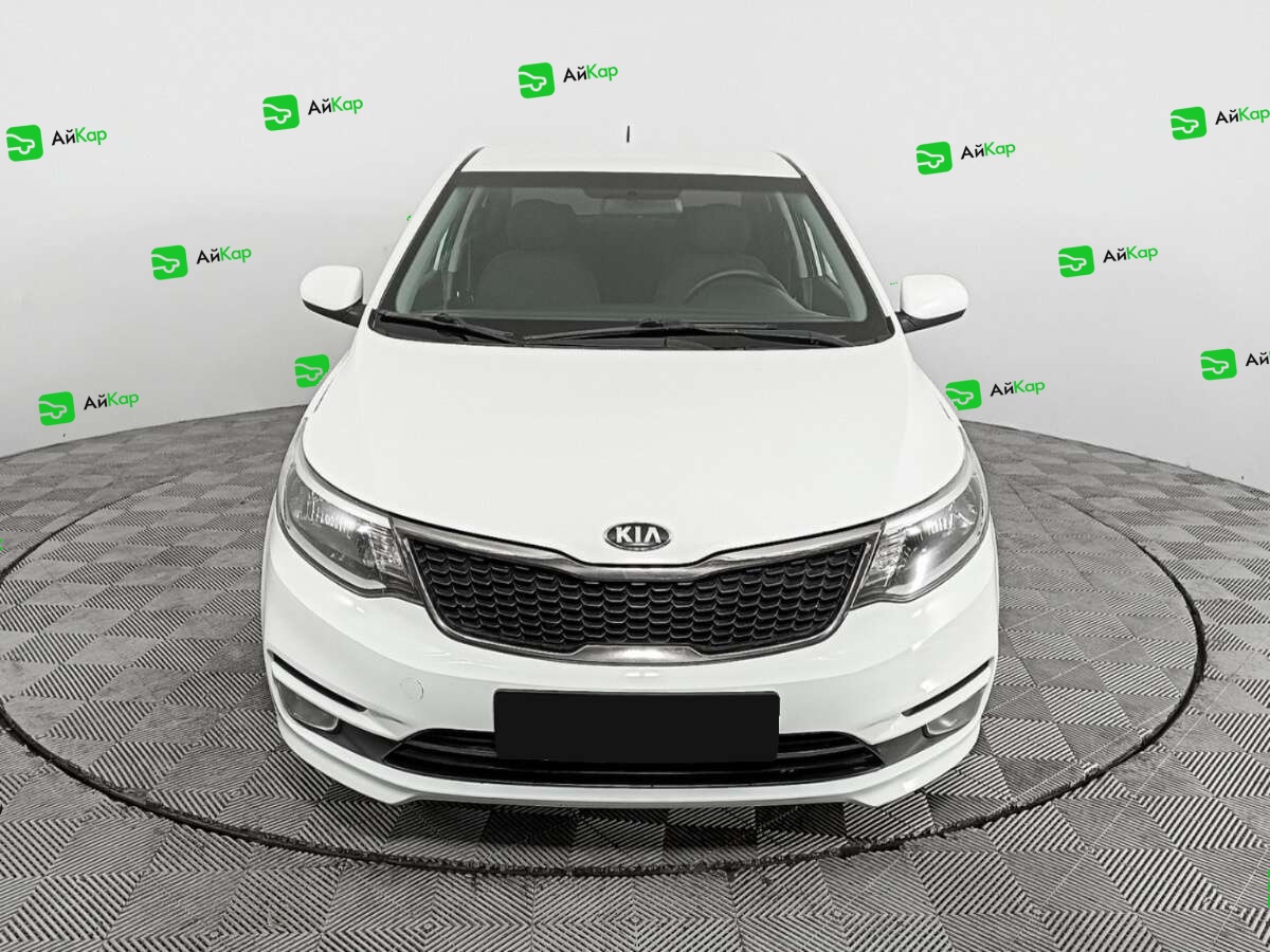 Kia Rio с пробегом — 2015 год. Фото: #1