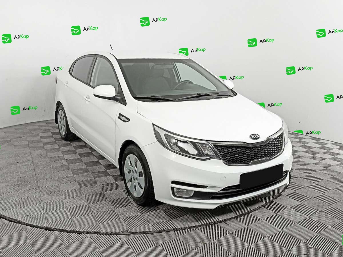 Kia Rio с пробегом — 2015 год. Фото: #2
