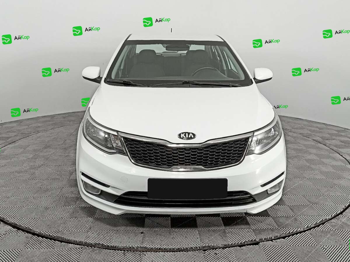 Kia Rio с пробегом — 2015 год. Фото: #1
