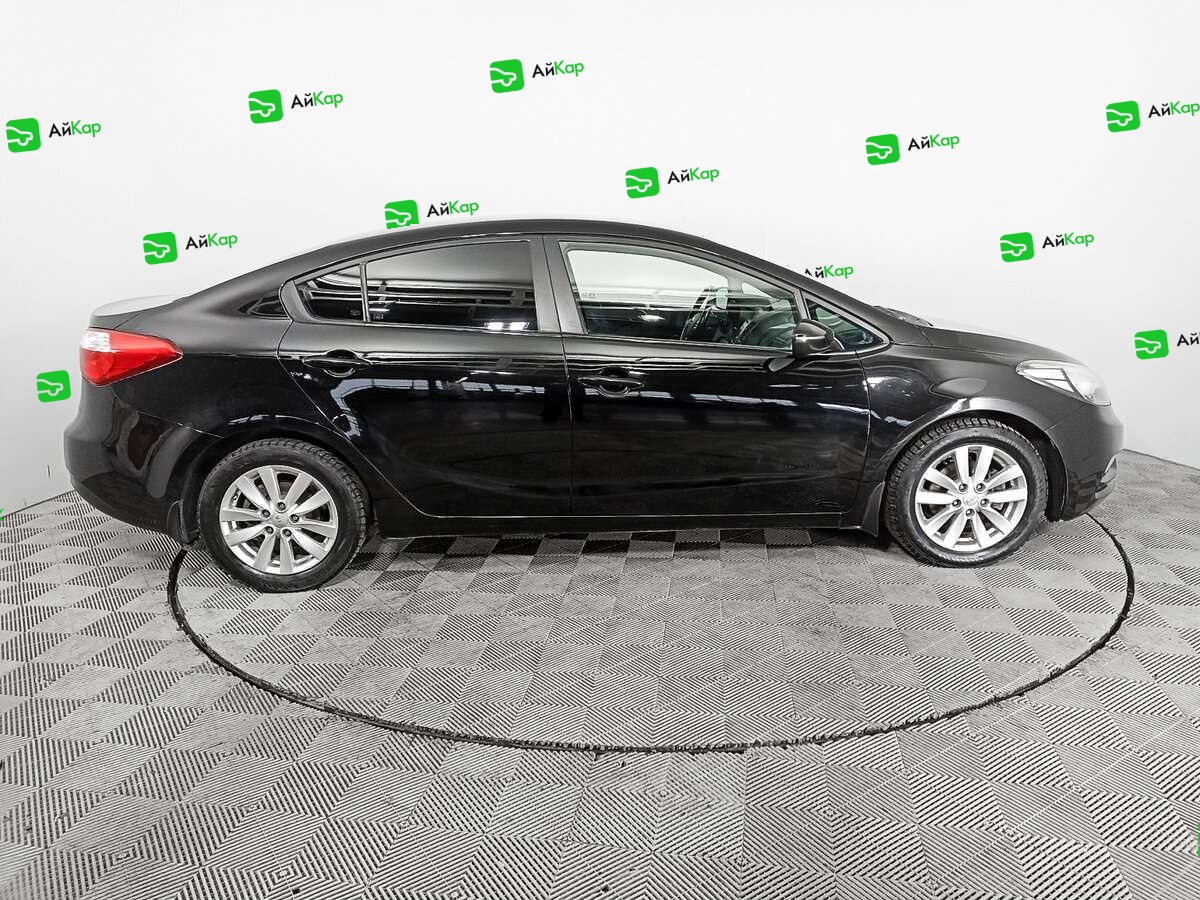 Kia Cerato с пробегом — 2013 год. Фото: #3