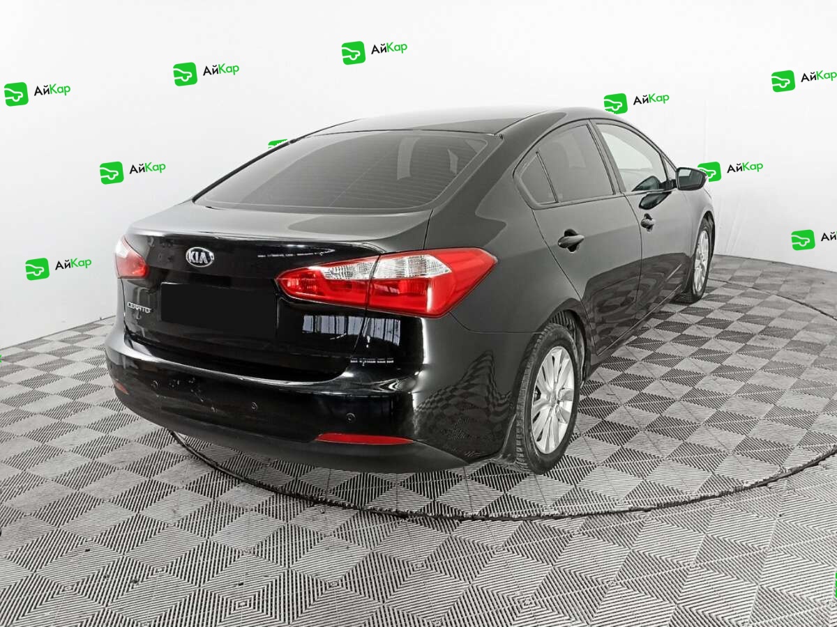 Kia Cerato с пробегом — 2013 год. Фото: #4