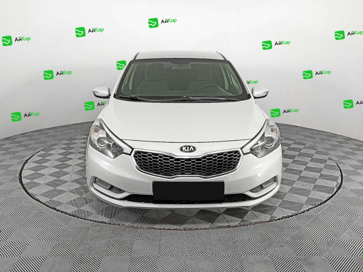 Kia Cerato с пробегом — 2014 год. Фото: #1