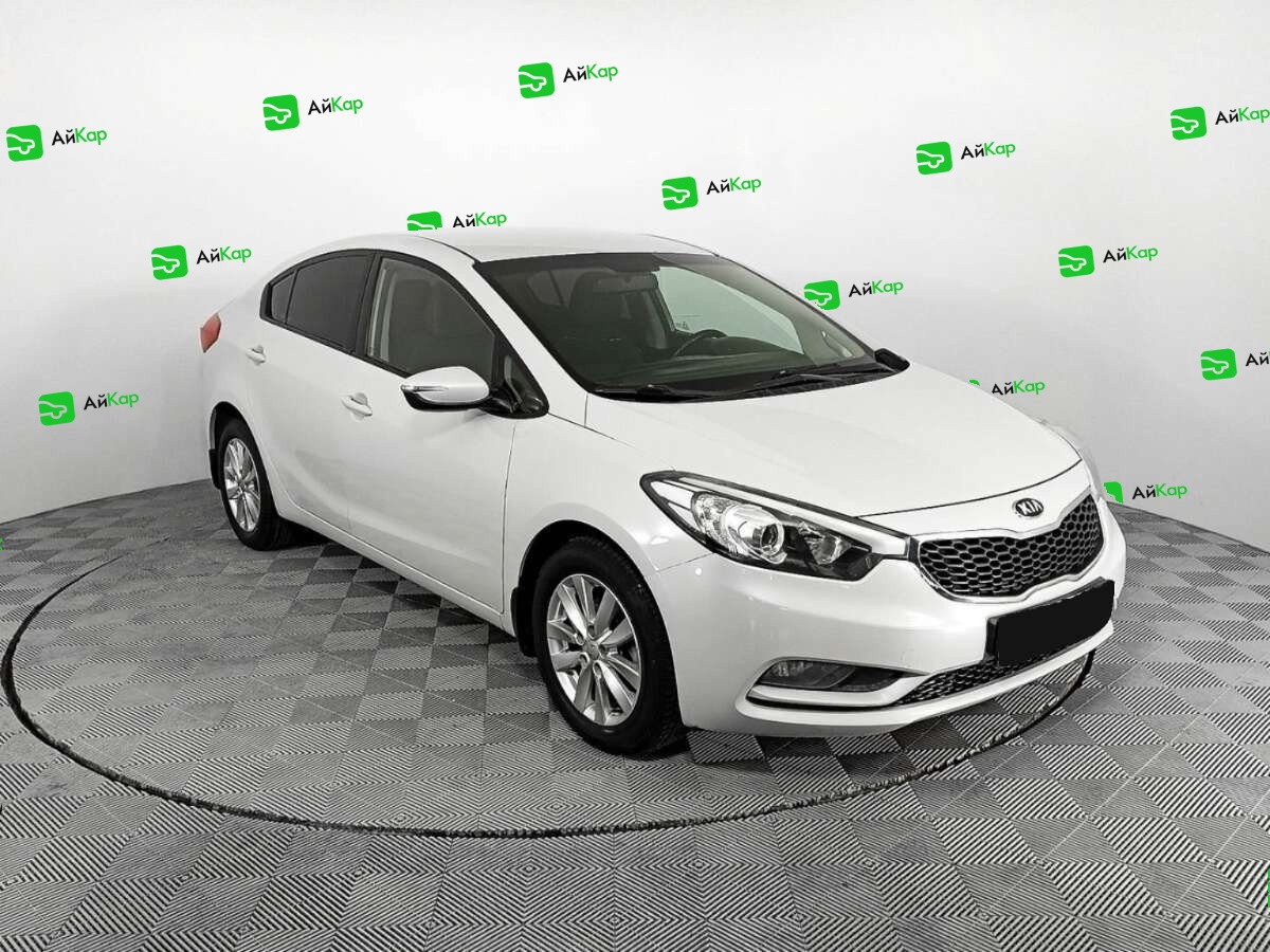 Kia Cerato с пробегом — 2014 год. Фото: #2