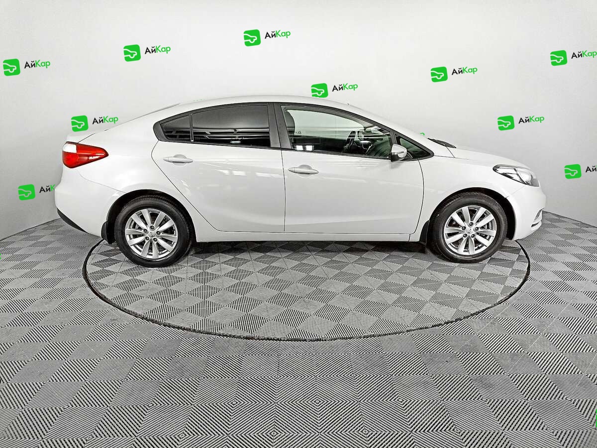 Kia Cerato с пробегом — 2014 год. Фото: #3