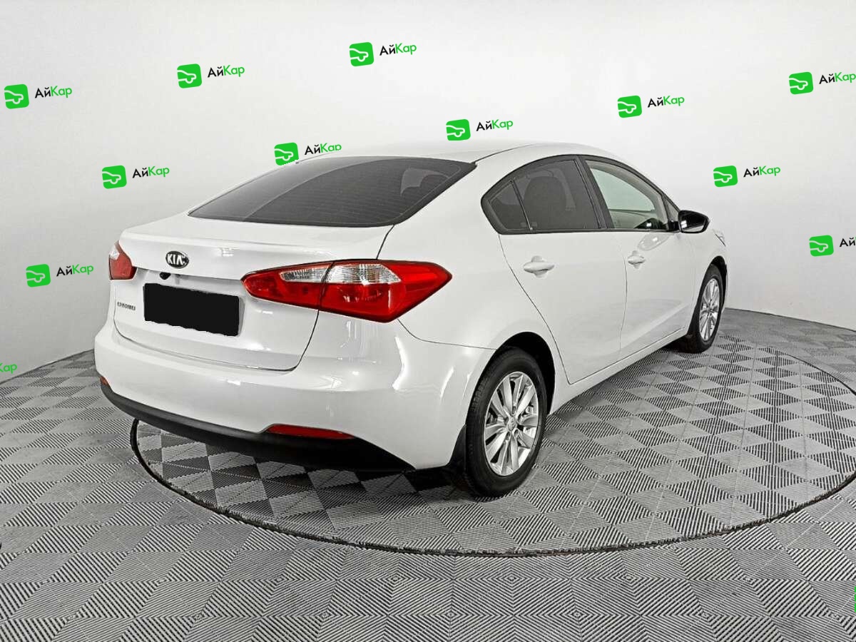 Kia Cerato с пробегом — 2014 год. Фото: #4