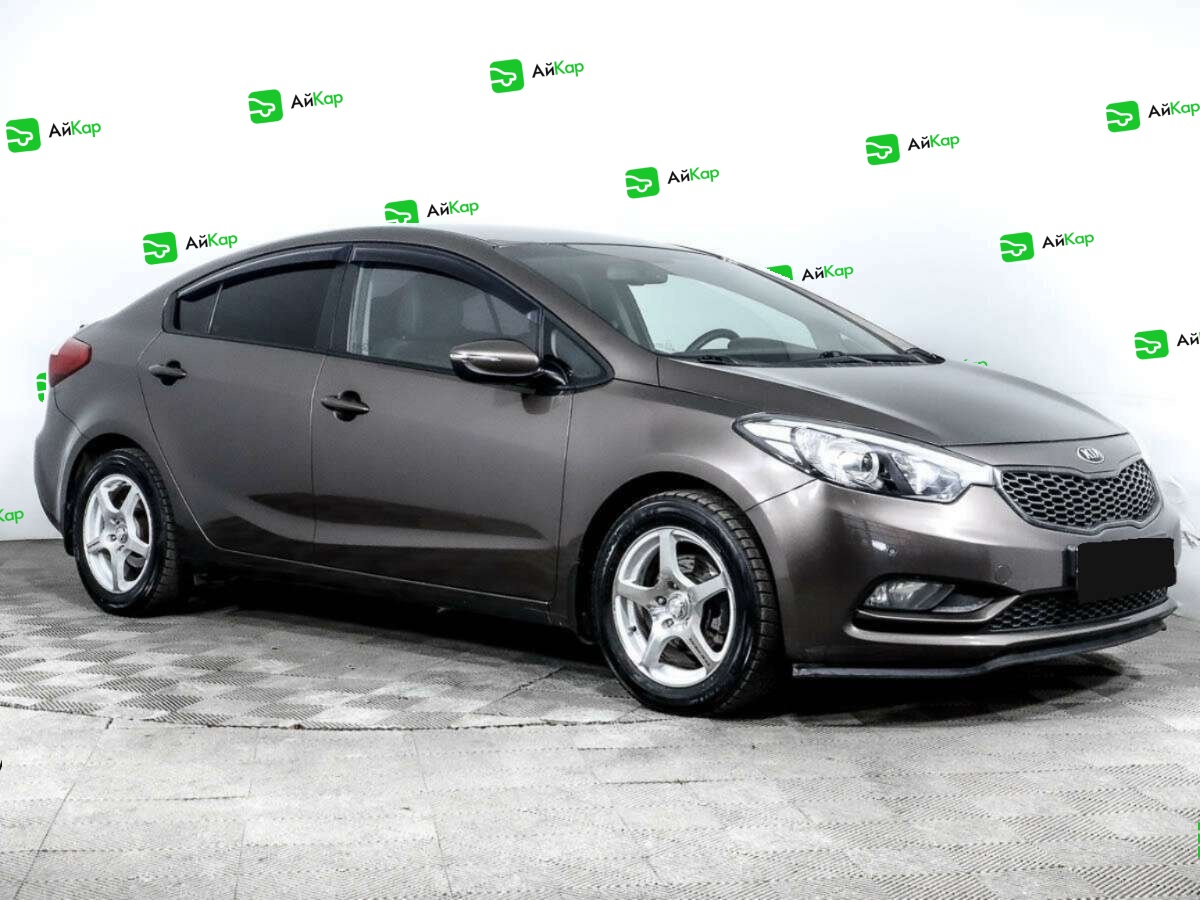 Kia Cerato с пробегом — 2015 год. Фото: #2
