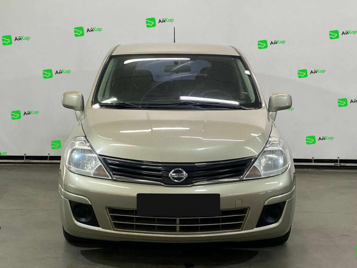 Nissan Tiida с пробегом — 2013 год. Фото: #1