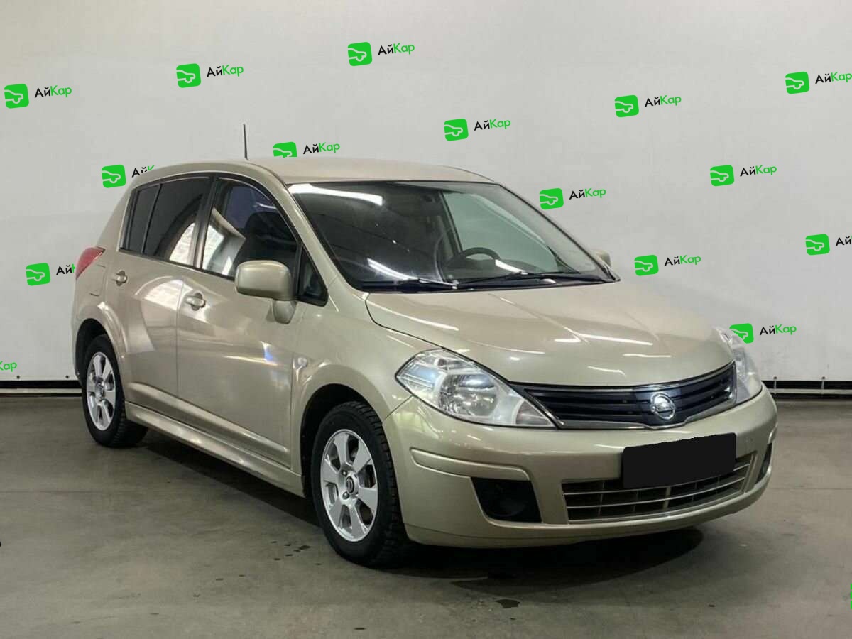 Nissan Tiida с пробегом — 2013 год. Фото: #2
