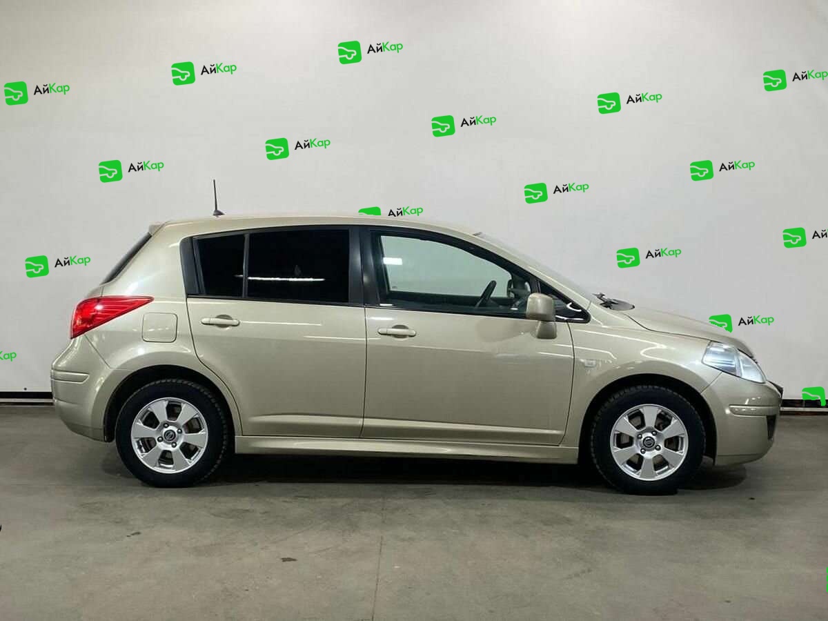 Nissan Tiida с пробегом — 2013 год. Фото: #3