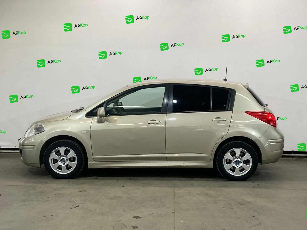 Nissan Tiida с пробегом — 2013 год. Фото: #7