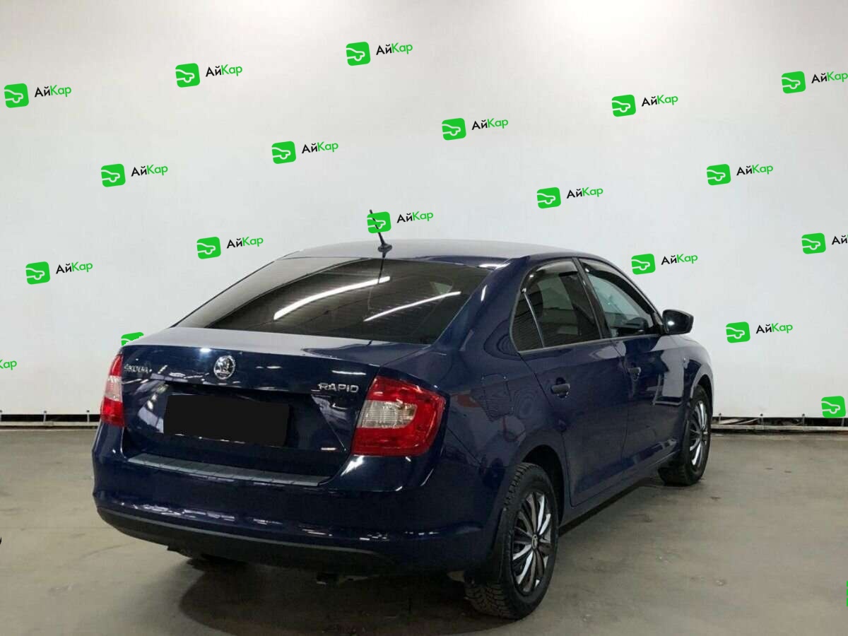 Skoda Rapid с пробегом — 2015 год. Фото: #4