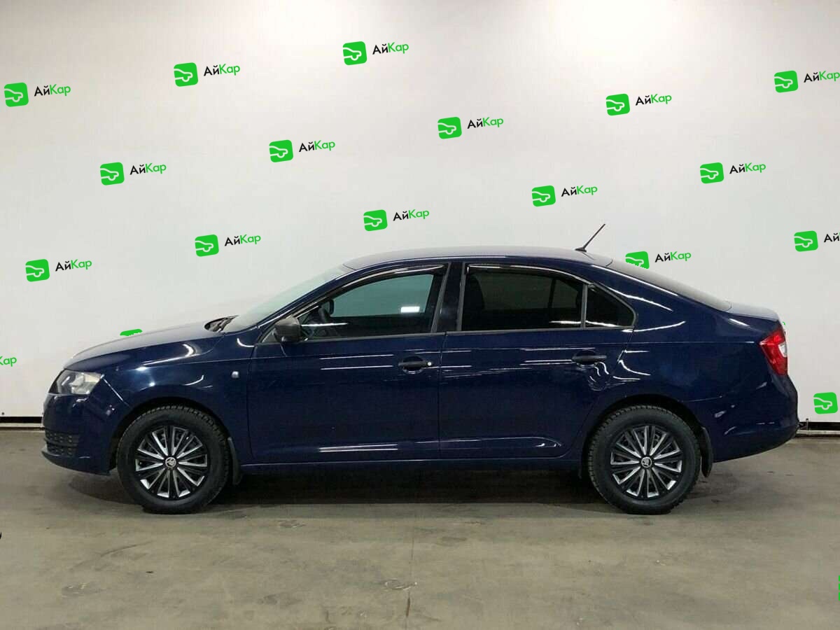 Skoda Rapid с пробегом — 2015 год. Фото: #7