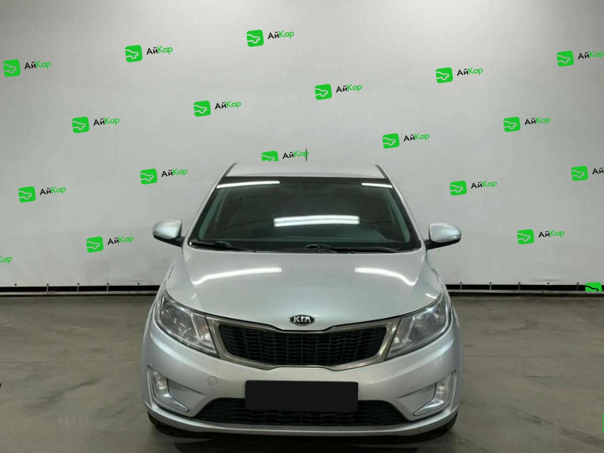 Kia Rio с пробегом — 2014 год. Фото: #1