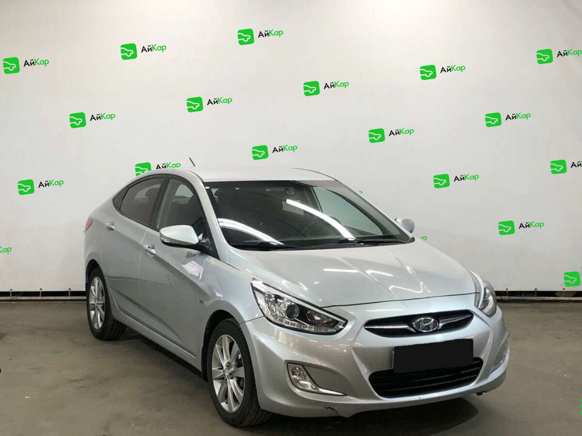 Hyundai Solaris с пробегом — 2014 год. Фото: #2