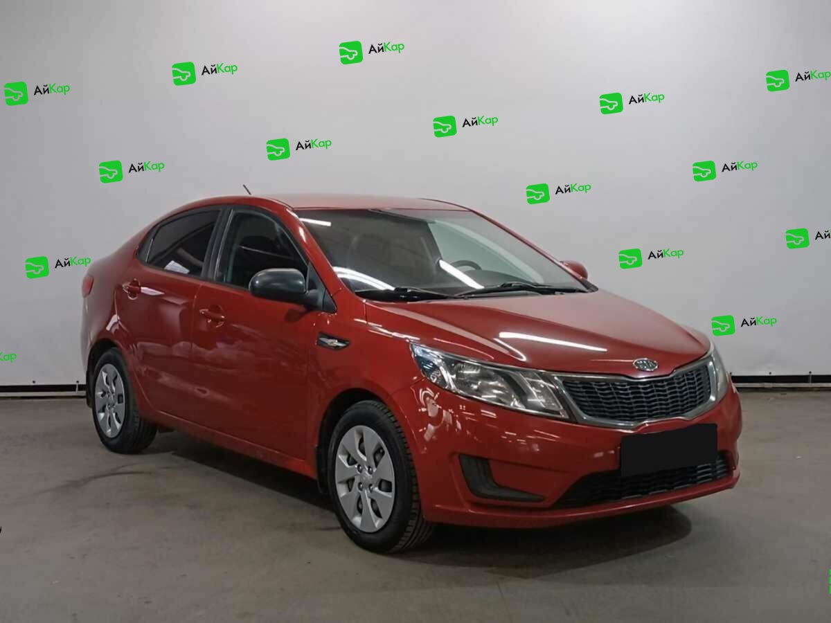 Kia Rio с пробегом — 2012 год. Фото: #2