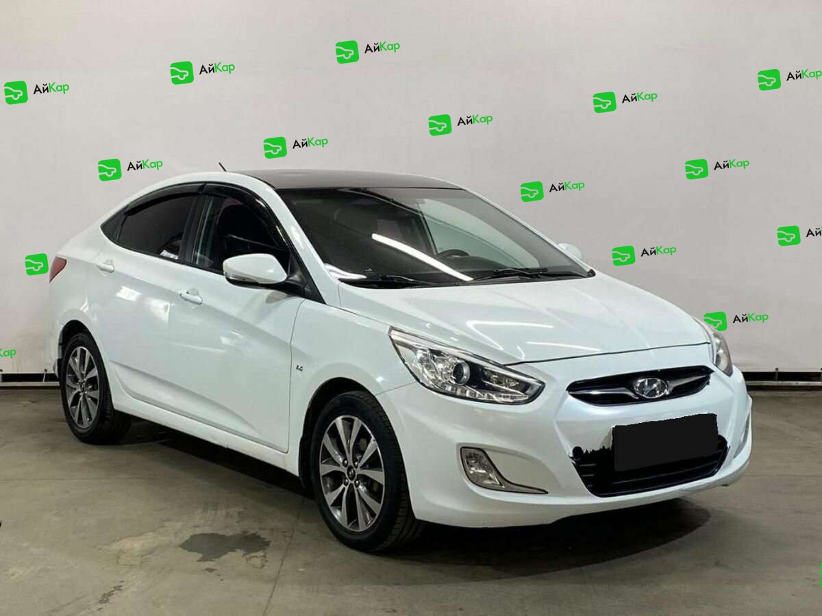 Hyundai Solaris с пробегом — 2013 год. Фото: #2