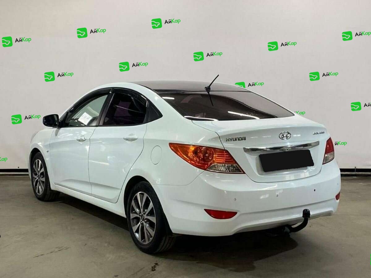 Hyundai Solaris с пробегом — 2013 год. Фото: #6