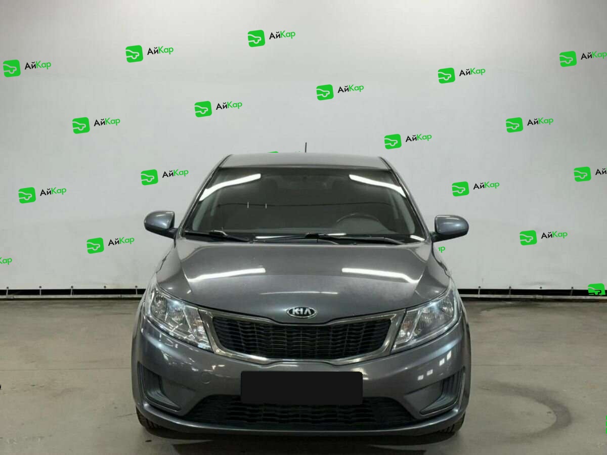 Kia Rio с пробегом — 2014 год. Фото: #1