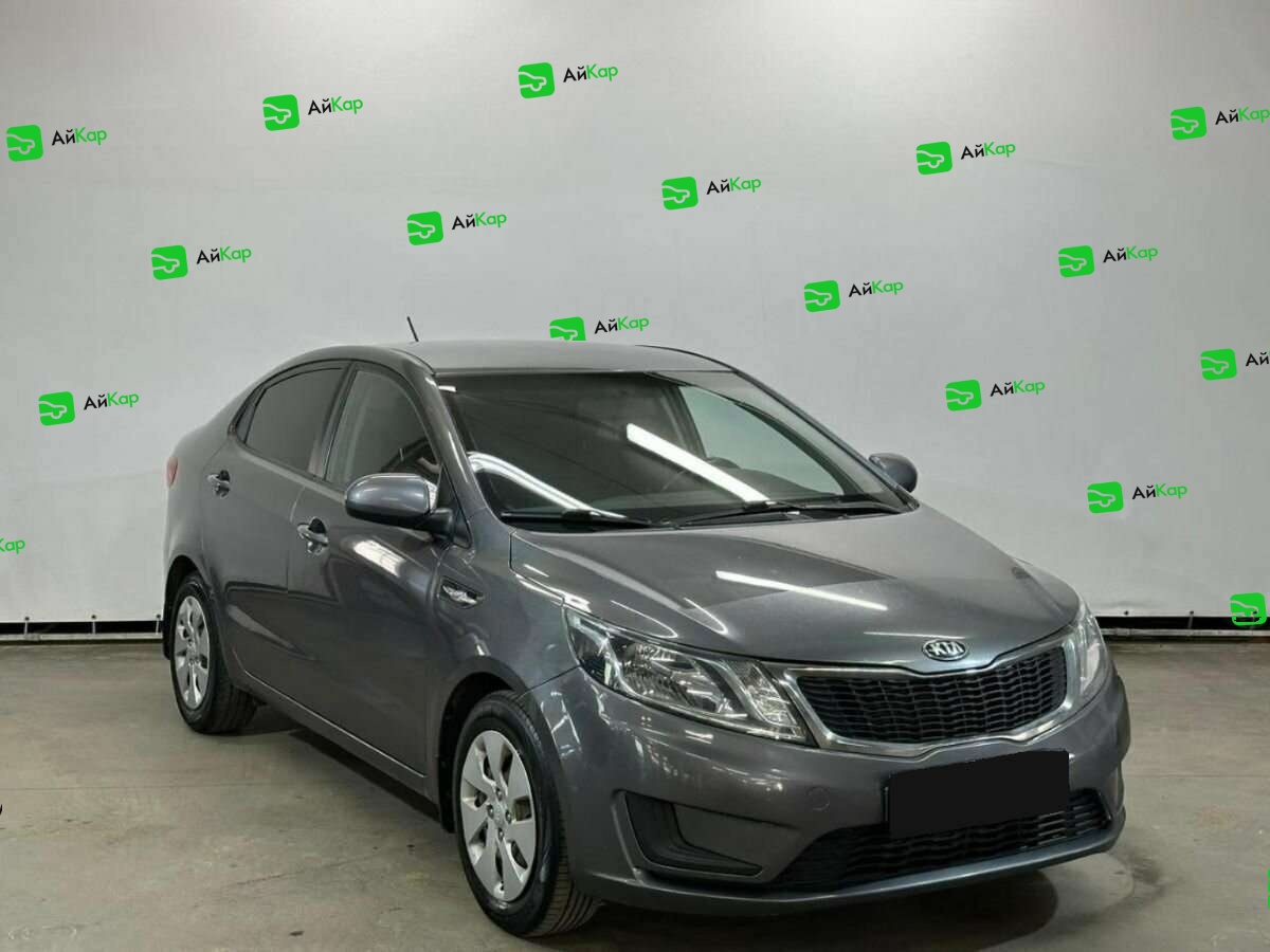 Kia Rio с пробегом — 2014 год. Фото: #2