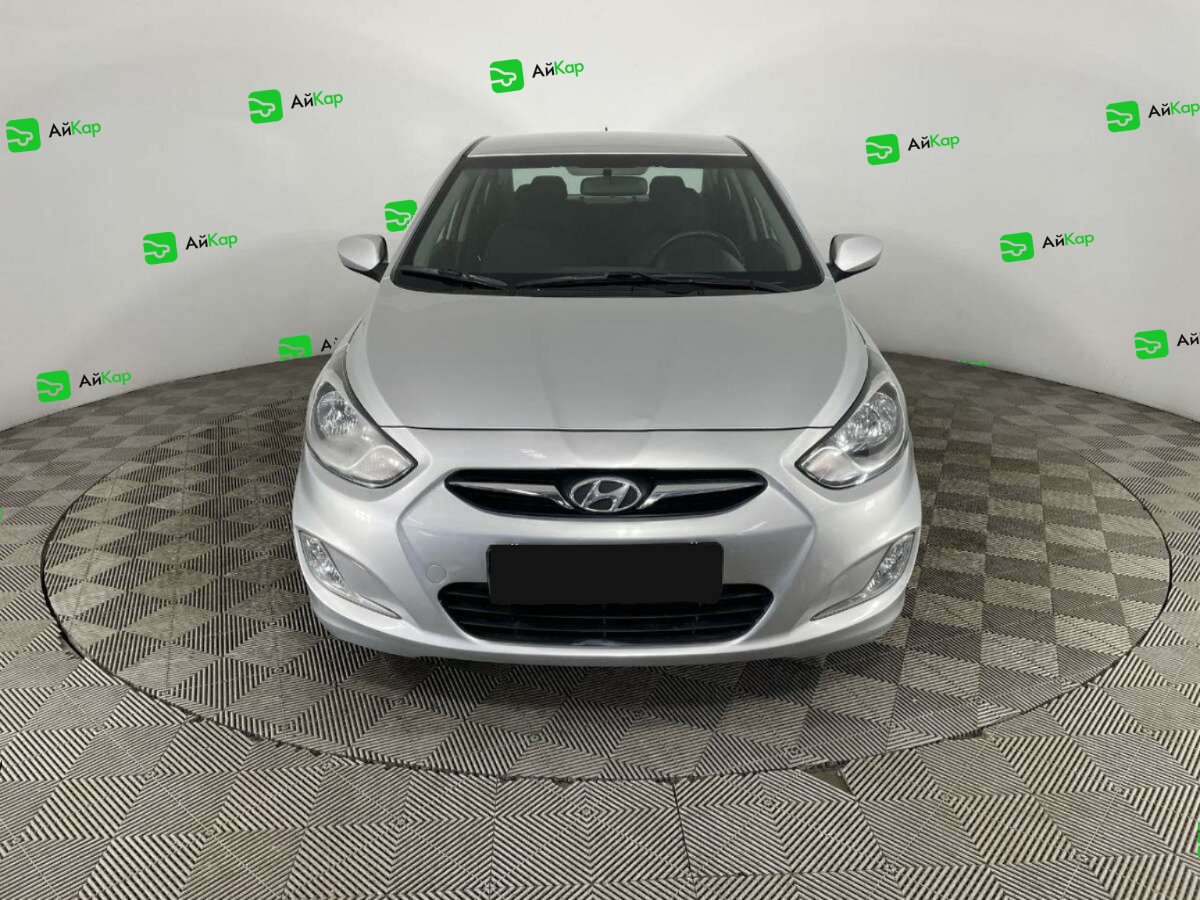 Hyundai Solaris с пробегом — 2012 год. Фото: #1