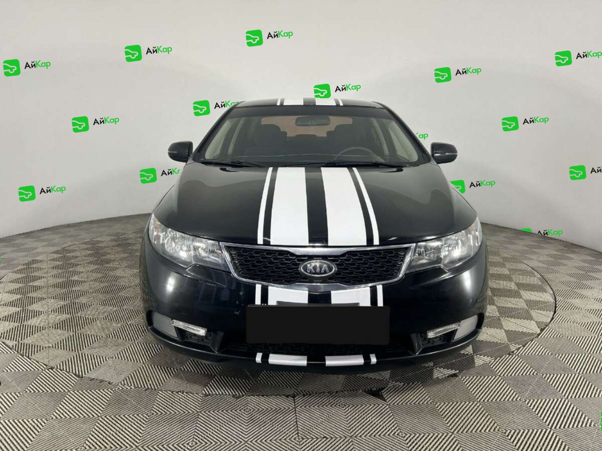 Kia Cerato с пробегом — 2013 год. Фото: #1