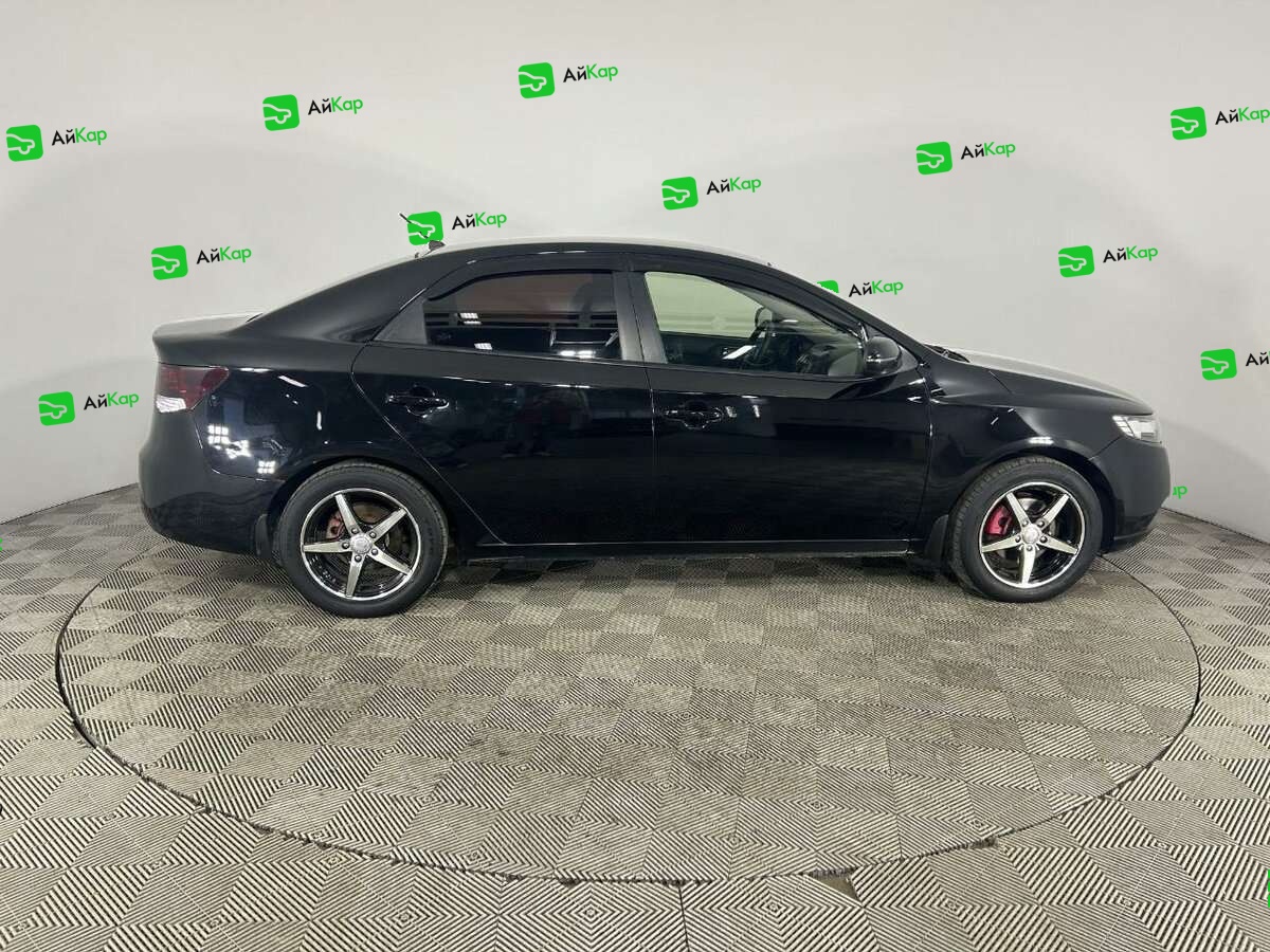 Kia Cerato с пробегом — 2013 год. Фото: #2