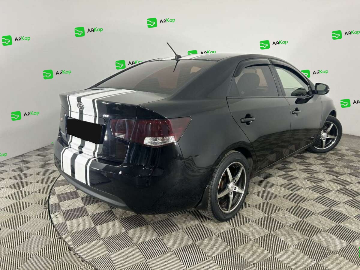 Kia Cerato с пробегом — 2013 год. Фото: #3