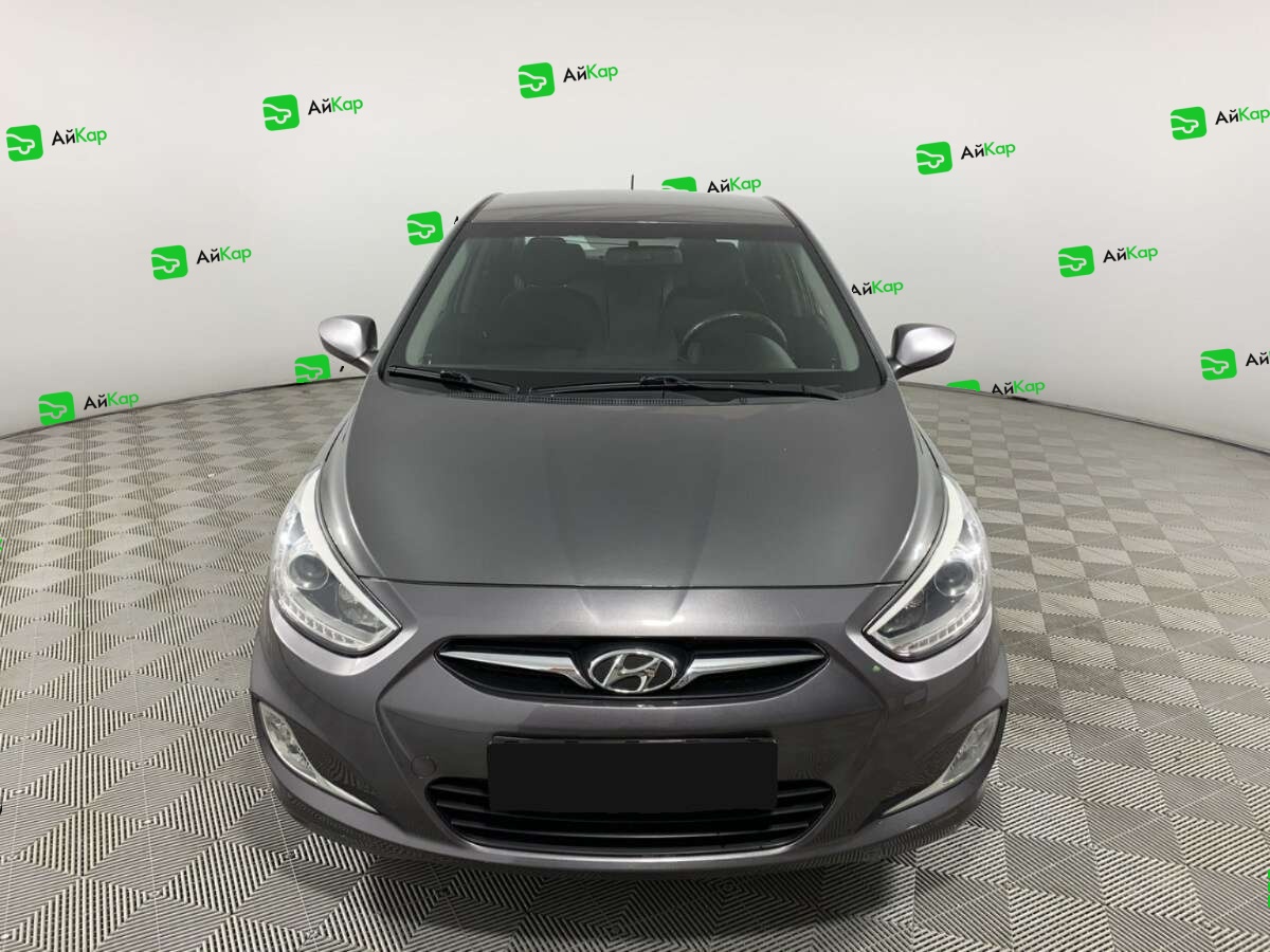 Hyundai Solaris с пробегом — 2013 год. Фото: #1