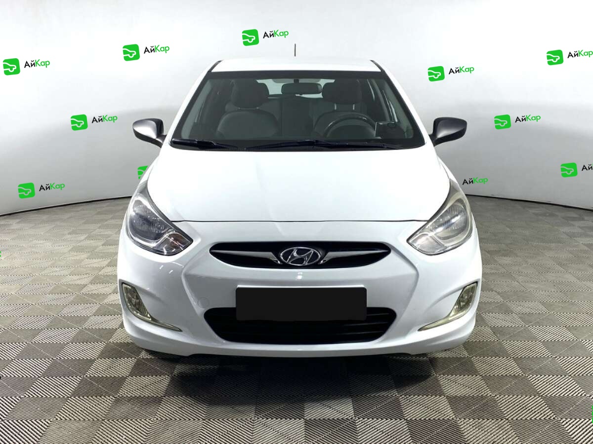 Hyundai Solaris с пробегом — 2014 год. Фото: #1