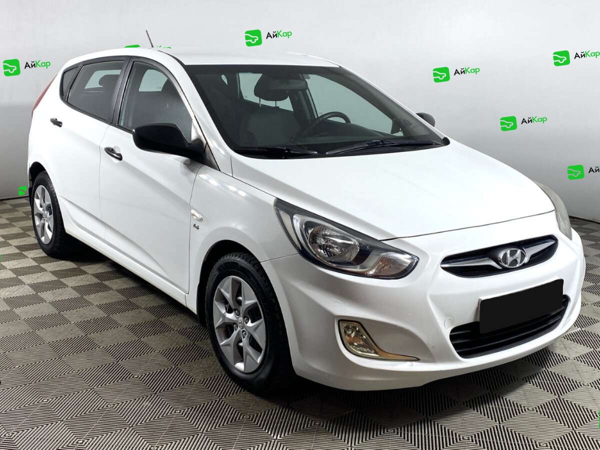 Hyundai Solaris с пробегом — 2014 год. Фото: #2