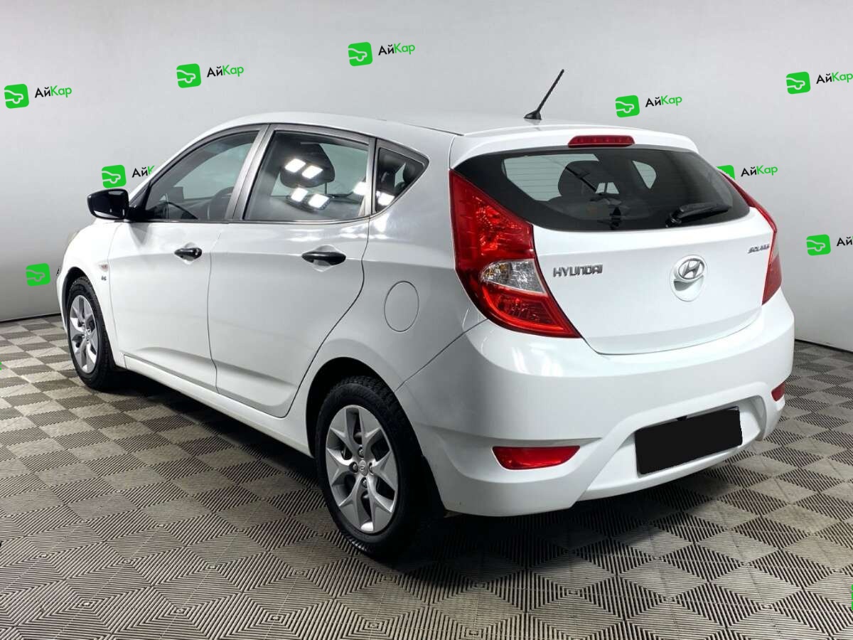 Hyundai Solaris с пробегом — 2014 год. Фото: #6