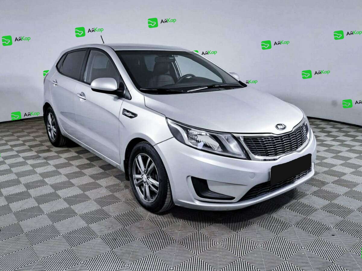 Kia Rio с пробегом — 2013 год. Фото: #2