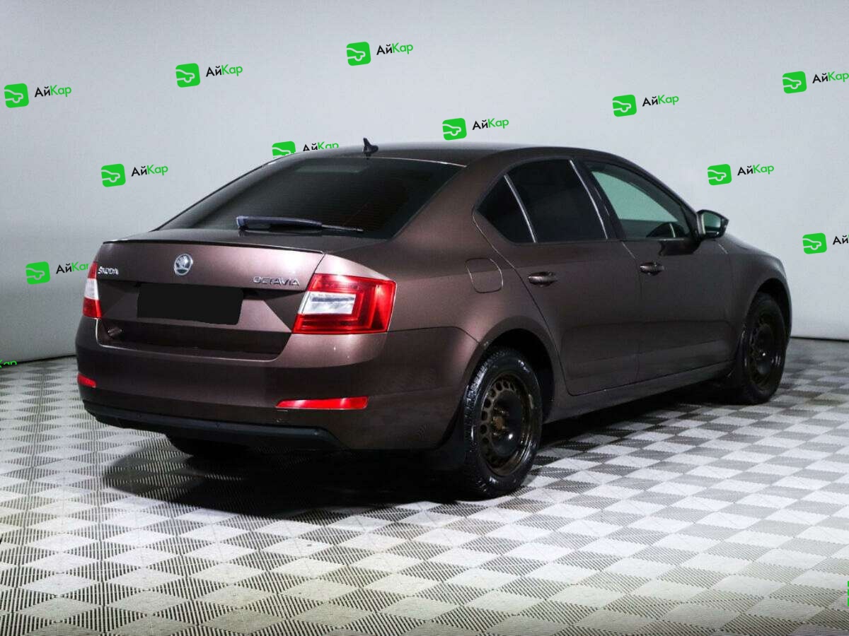 Skoda Octavia с пробегом — 2013 год. Фото: #3
