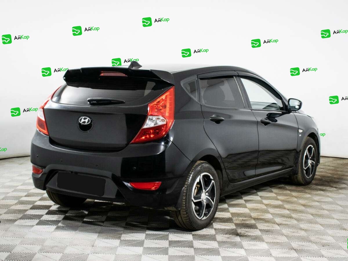 Hyundai Solaris с пробегом — 2012 год. Фото: #3