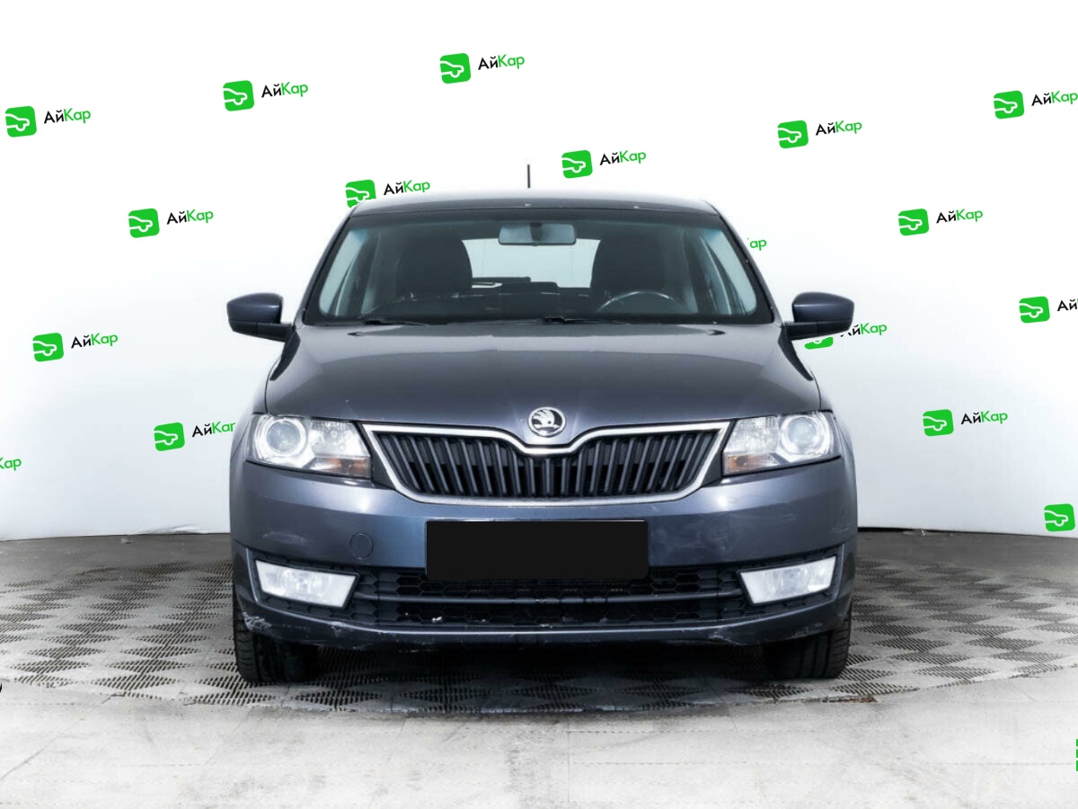 Skoda Rapid с пробегом — 2014 год. Фото: #1