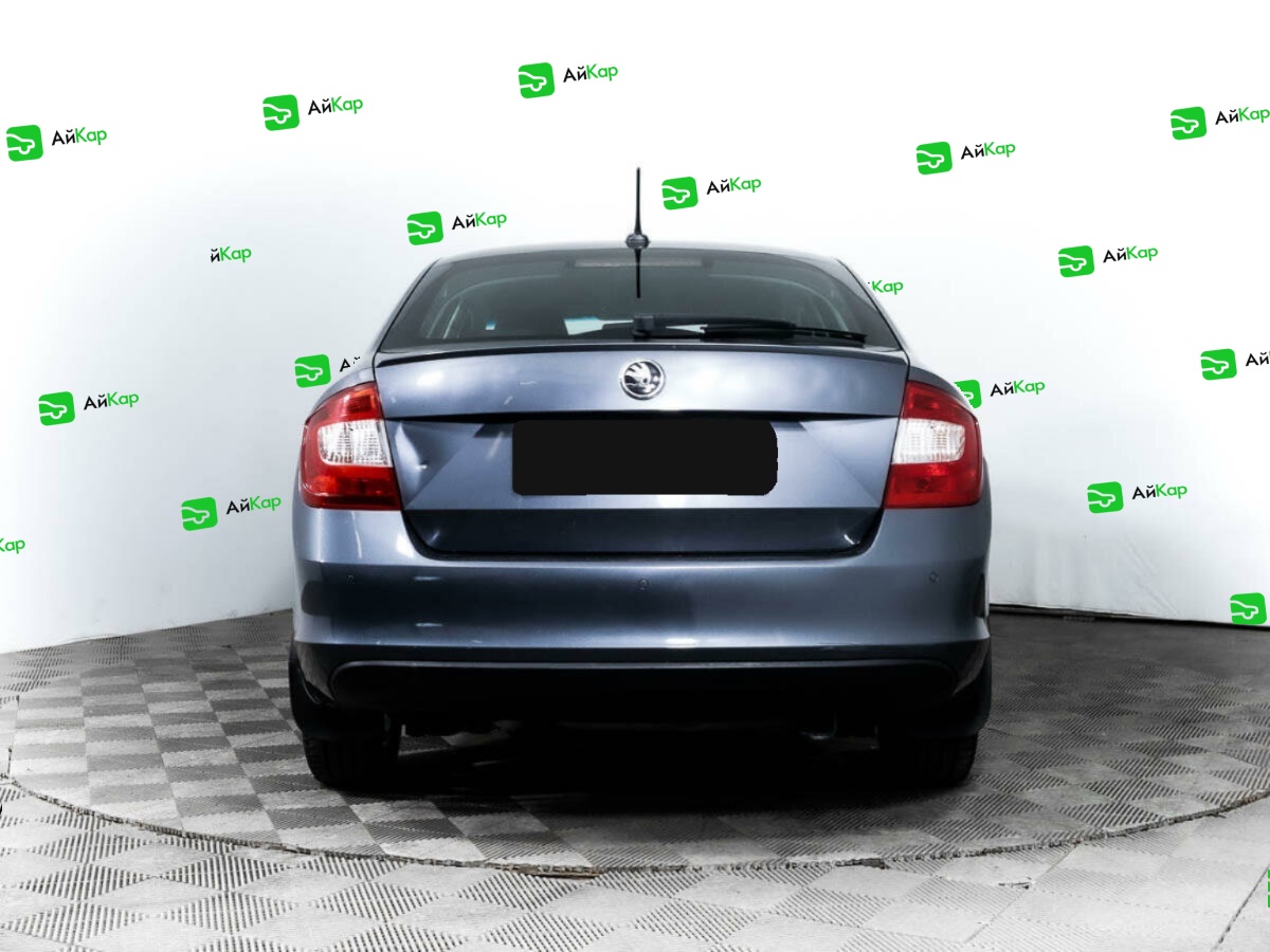 Skoda Rapid с пробегом — 2014 год. Фото: #4