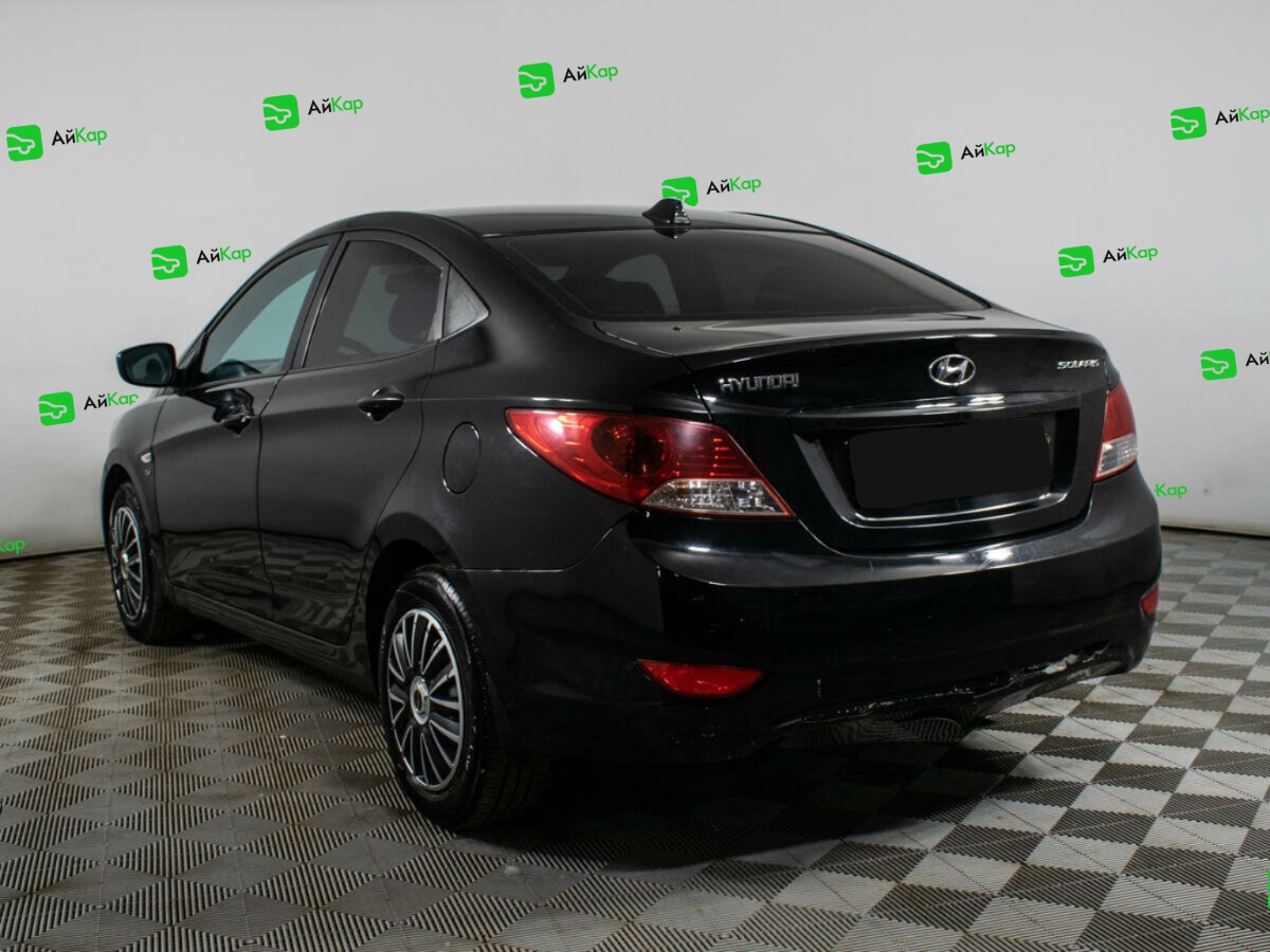 Hyundai Solaris с пробегом — 2013 год. Фото: #6