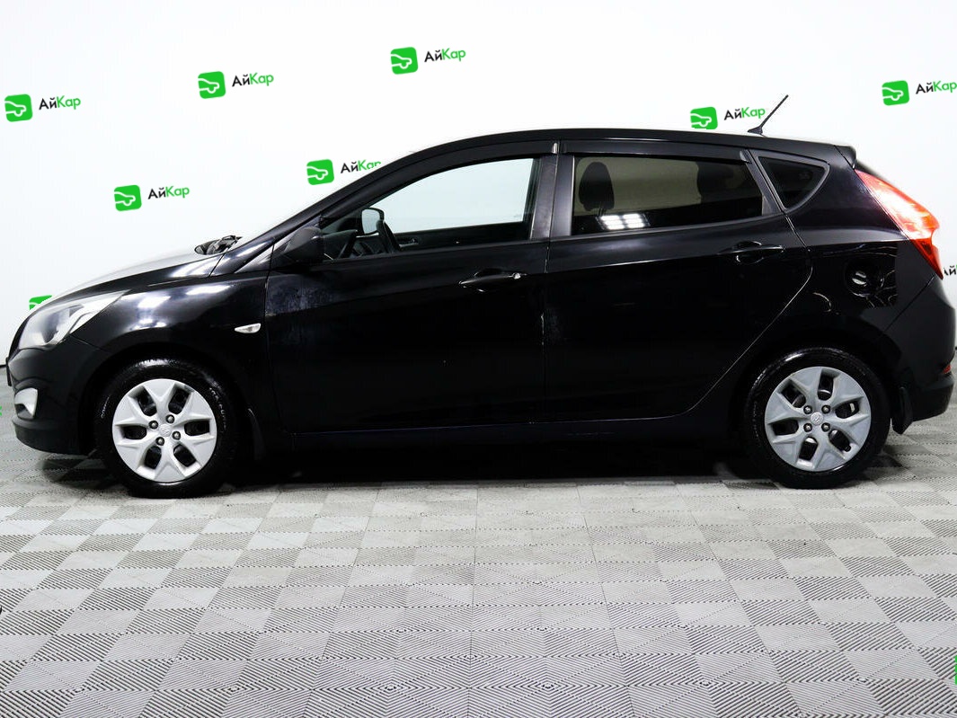 Hyundai Solaris с пробегом — 2015 год. Фото: #7