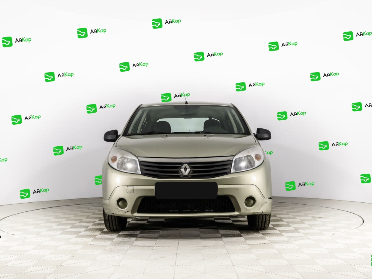 Renault Sandero с пробегом — 2013 год. Фото: #1