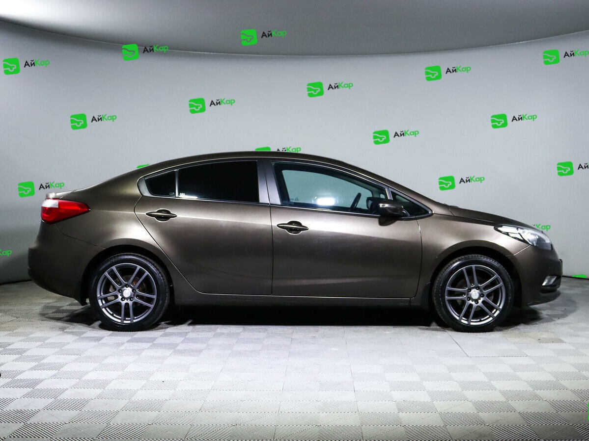 Kia Cerato с пробегом — 2015 год. Фото: #3