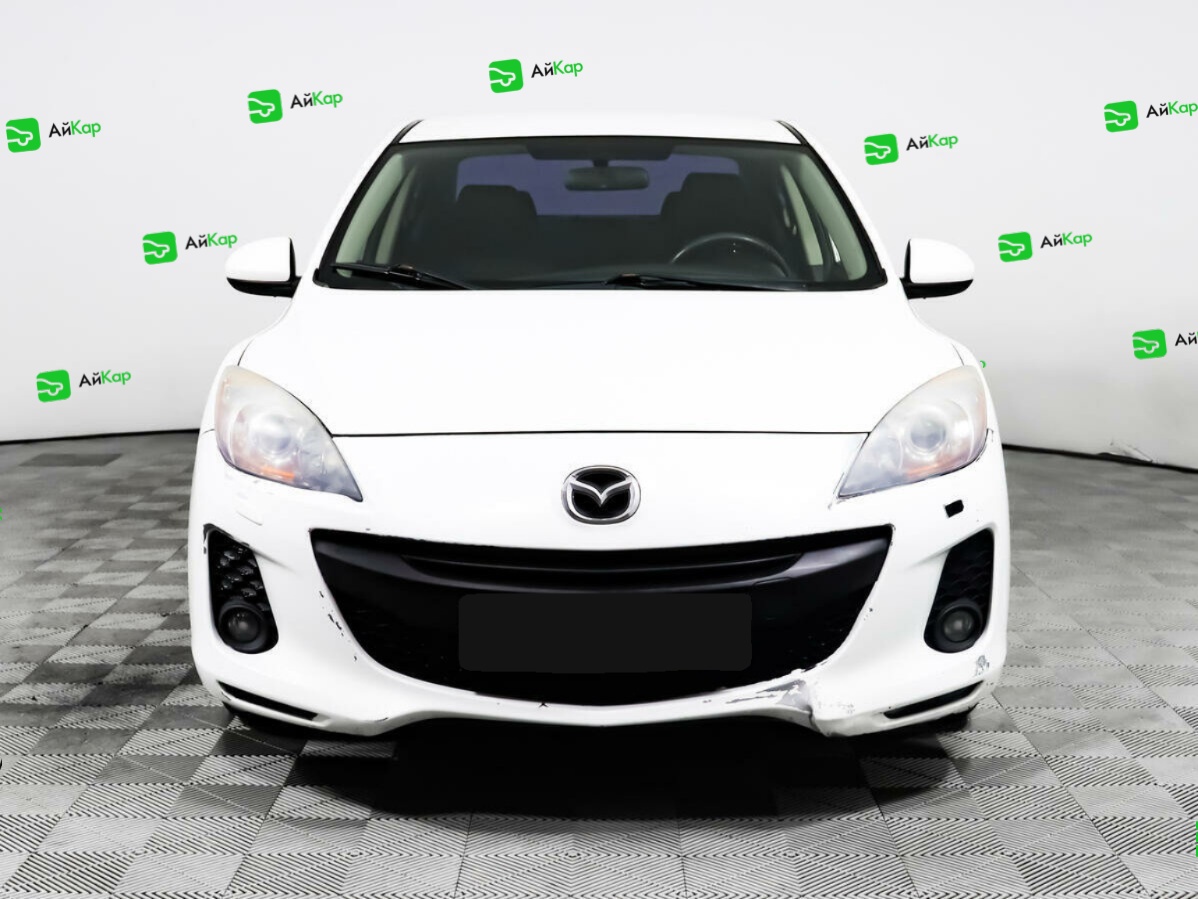 Mazda 3 с пробегом — 2012 год. Фото: #1
